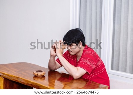 Man Considering Decisions While Sitting. Serene Moment of a Man in Deep Thought.