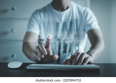 man Contact us or Customer support hotline people connect. Businessman using smart phone and touching on virtual screen contact icons ( email, telephone, address, live chat,) - Shutterstock ID 2207894753