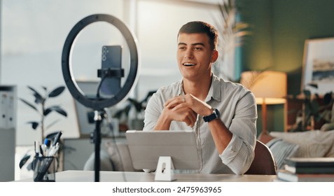 Man, content creator and home with smartphone for social media, online vlog and live streaming. Influencer, happy and smile for podcast as entrepreneur for educational or business talk and motivation - Powered by Shutterstock