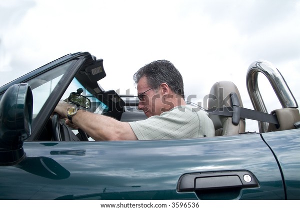 Man Convertible Sports Car Driving Top Stock Photo Edit Now