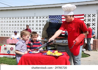 Man cooking at a 4th of July Barbecue