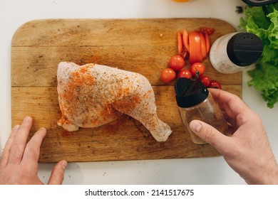 Man Cooking Chicken. сlose-up Portrait Of Cooking