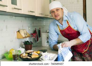  Man Is Cooking In The Kitchen