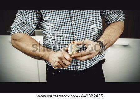 Similar – young latin man typing on his phone with emoji emoticons.