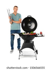 Man cooking on barbecue grill, white background