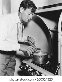 Man Cooking On Stove