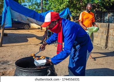 Man Cooking Traditional Botswana Food Boiled Cow Heels