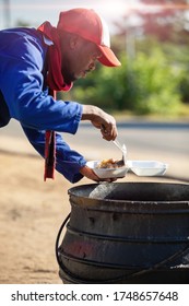 Man Cooking Traditional Botswana Food Boiled Cow Heels