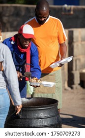 Man Cooking Traditional Botswana Food Boiled Cow Heels