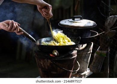 The Man Cooking Vegetables In Frying Pan On Vintage Stove ,cooking With Firewood ,cook By Myself For Eat In Home