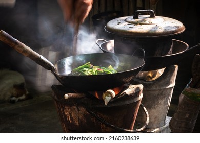 The Man Cooking Vegetables In Frying Pan On Vintage Stove ,cooking With Firewood ,cook By Myself For Eat In Home