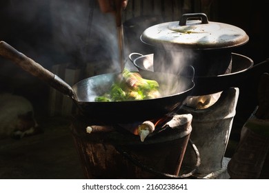 The Man Cooking Vegetables In Frying Pan On Vintage Stove ,cooking With Firewood ,cook By Myself For Eat In Home