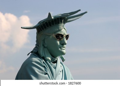 Man In Costume Of Statue Of Liberty