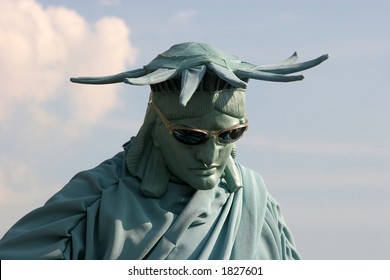 Man In Costume Of Statue Of Liberty