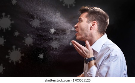 Man is coughing trying to cover his mouth.  Influenza, cold, flu, coronavirus. Infection through an airborne droplet. Droplets of saliva, water and viruses. Cough and sneeze. Man 30-40 aged