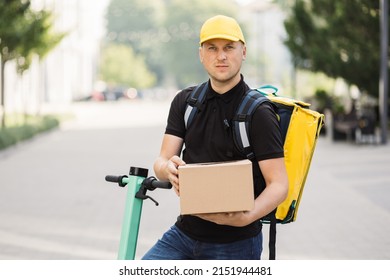 Man Courier On Scooter Delivering Express Stock Photo 2151944481 ...