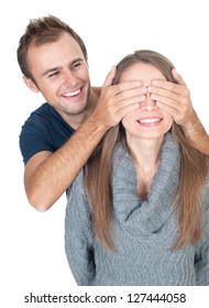 Man Covering Her Lover's Eyes Before Making Surprise