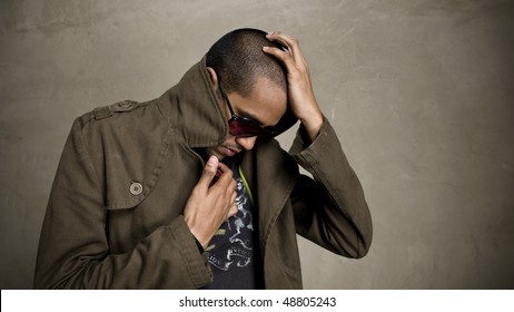 Man Covers Up And Pops His Jacket Collar