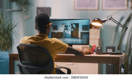 Man creating 3D cartoon on computer