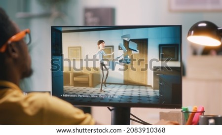 Man creating 3D cartoon on computer