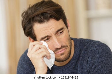 Man Crying At Home