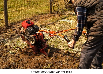 Man Cultivating Garden Stock Photo 2144968655 | Shutterstock