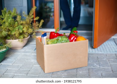 Man Customer Accepting Box With Food. Delivery During A Pandemic Covid-19. Stay At Home. Online Shopping. Contactless Delivery.