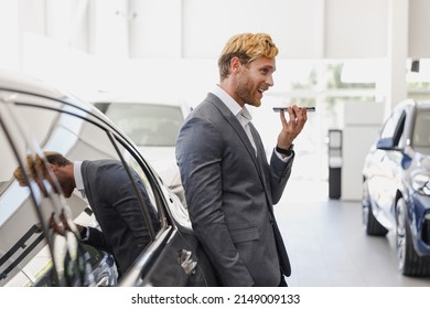 Man Customer Buyer Client In Classic Suit Record Voice Message Mobile Cell Phone Choose Auto Car Wants To Buy New Automobile In Showroom Vehicle Salon Dealership Store Motor Show Indoor Sale Concept.