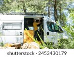 Man customizing a camper van