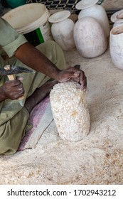 Man Cut Alabaster Stone For Vase