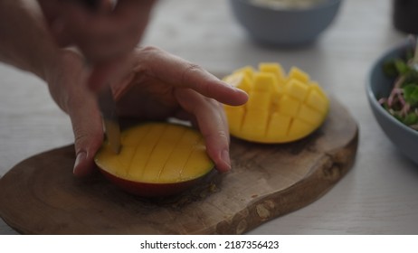 Man Cut Mango For Salad With Micro Greens And Mozzarella In Blue Bowl, Wide Photo