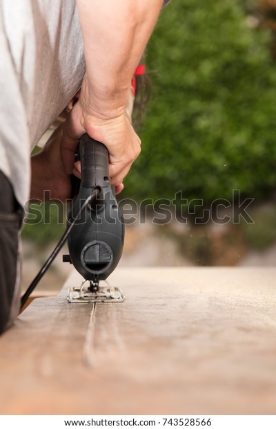 Man Cutting Cutout Jigsaw Into Countertop Stock Photo Edit Now