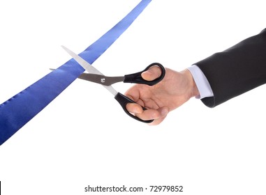 A Man Cutting A Ribbon