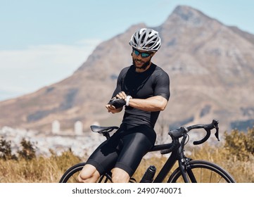 Man, cycling and watch for checking heart rate in outdoor, exercise and tracking pulse for time. Male person, biker and athlete for monitoring results during workout, sports training and fitness - Powered by Shutterstock