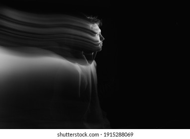 A Man In The Dark With Blurry Light. 