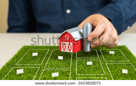 A man decides which plot of land to buy for a farm. Soil quality, location, cost, and business strategy. Investment planning, rural development, sustainable farming. Land market.