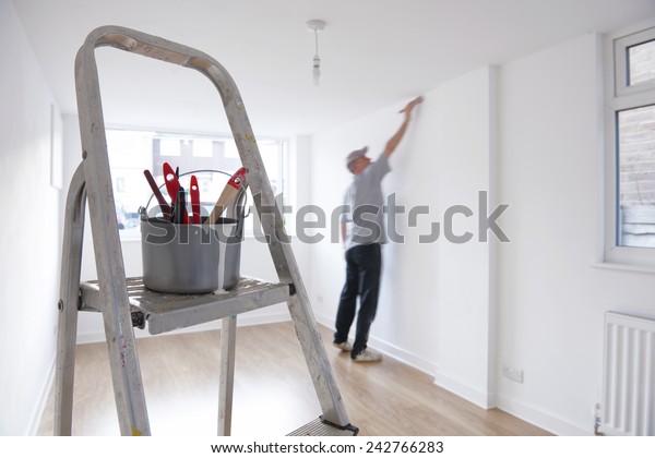 Man Decorating Room Ladder Paint Pot Stock Image Download Now