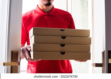 Man delivery pizza to customer