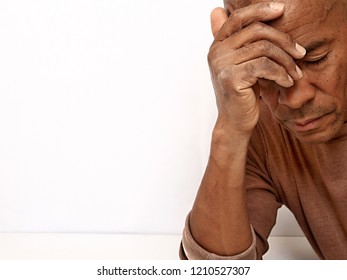 man with depression and migraine headache stock photo