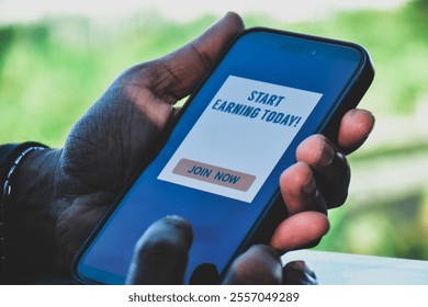 Man desided to join mobile application to make extra money online. Freelance work side hustle concept.