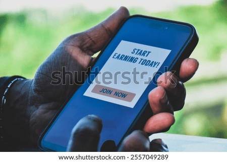 Man desided to join mobile application to make extra money online. Freelance work side hustle concept.