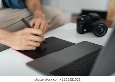 Man Designer using pen