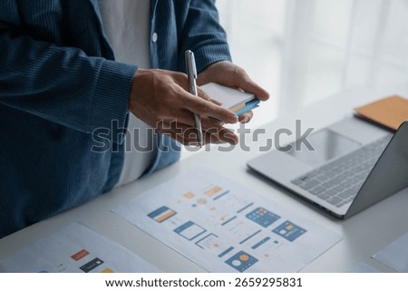 Man Designing UX UI and Programming in Tech Environment.