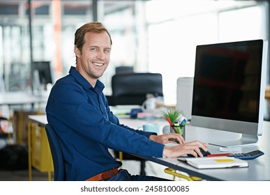 Man, desk and computer in portrait in office with smile with designer for creative project. Male worker, screen or workstation with technology for web design with graphic for website with confidence - Powered by Shutterstock