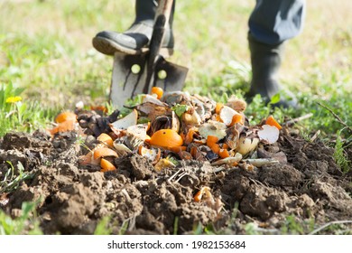 Man Digging And Composting For Sustainable Living