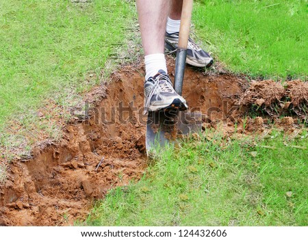 Man digging a hole