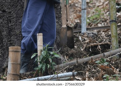 A man digging in the soil