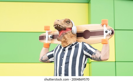 man with a dinosaur mask, and a skateboard - Powered by Shutterstock