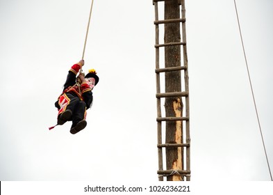 Man disguised as monkey in the flying pole dance at Chichicastenango, Guatemala