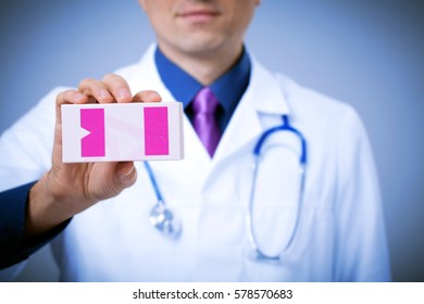 Man Doctor Holding A Medicine Box